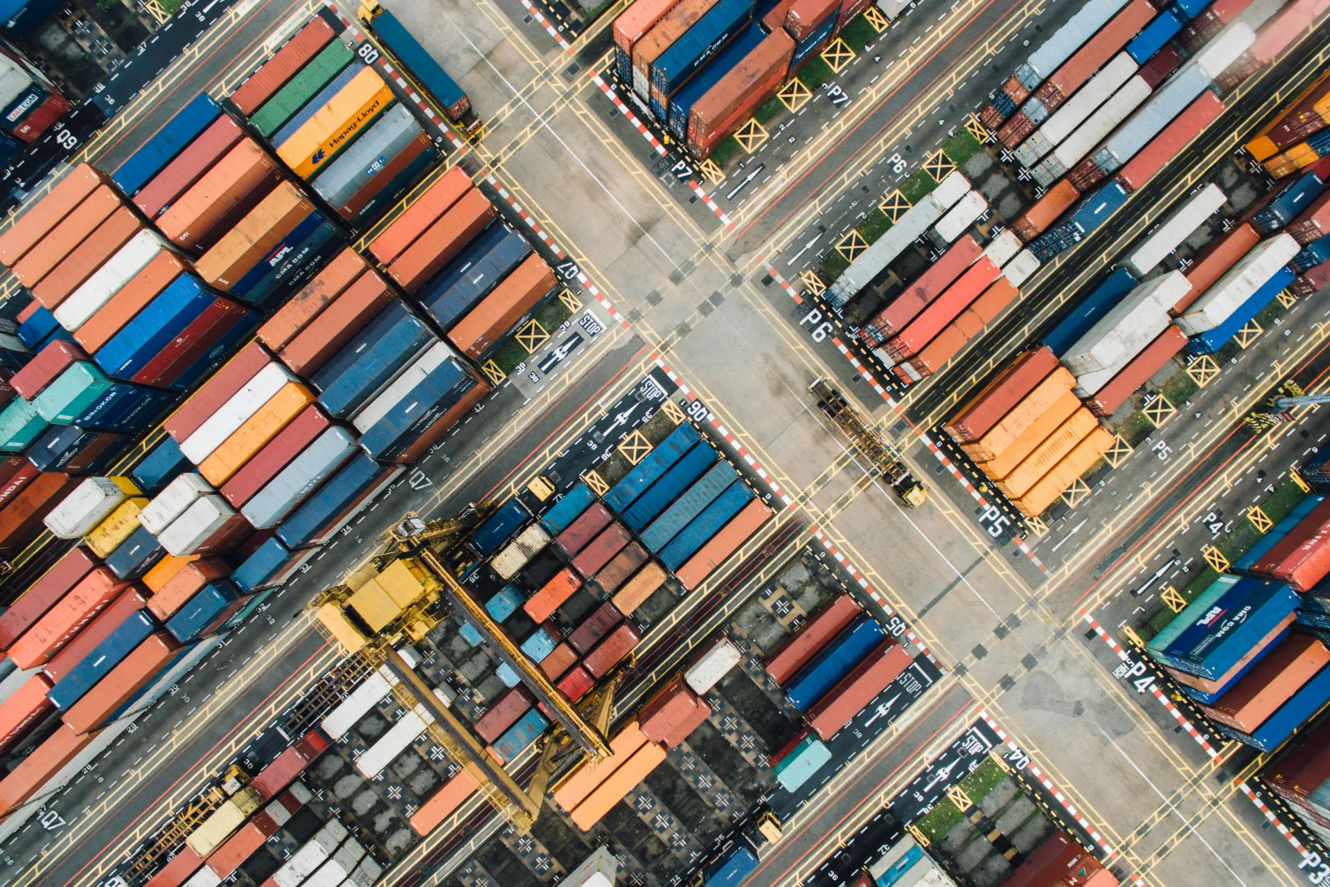 An overhead view of shipping containers and lanes in a logistics yard, from the original Nulane homepage.